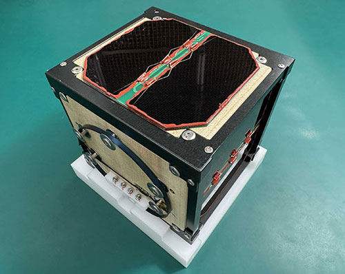 A closeup image of Lignosat, the first woodsen satellite
