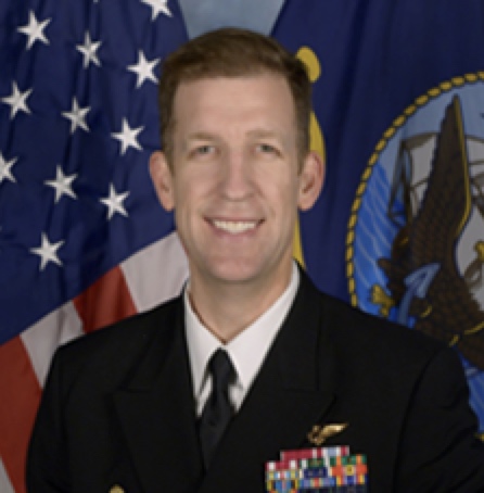 Captain Andy “Big Tuna” Berner is a Naval Aviator that has recently earned his Information Warfare Officer designation. Originally from Chatham, New Jersey, he graduated with merit from the United States Naval Academy in 1996 with a major in Systems Engineering and a minor in Spanish. He holds a Masters in Operations Research from the Naval Postgraduate School and a Masters in Defense Technology and Systems from the National University of Singapore (Temasek Defense Systems Institute).